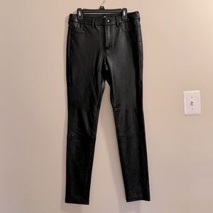 7 for all mankind black vegan leather skinny pants. Size small.